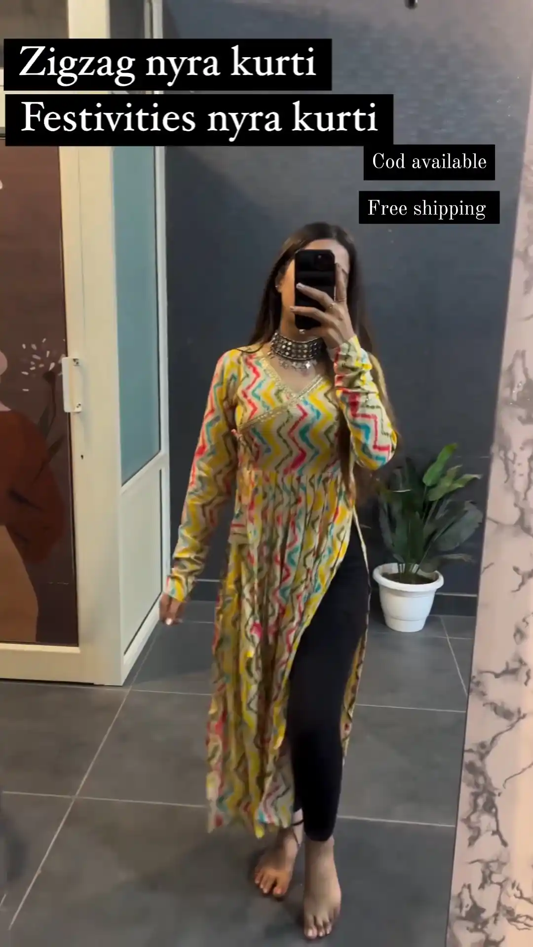 Yellow Printed Nayra Cut Kurti.png